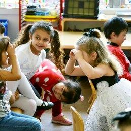 Children playing together in a classroom