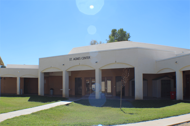St Agnes Center building exterior with a walkway and grass