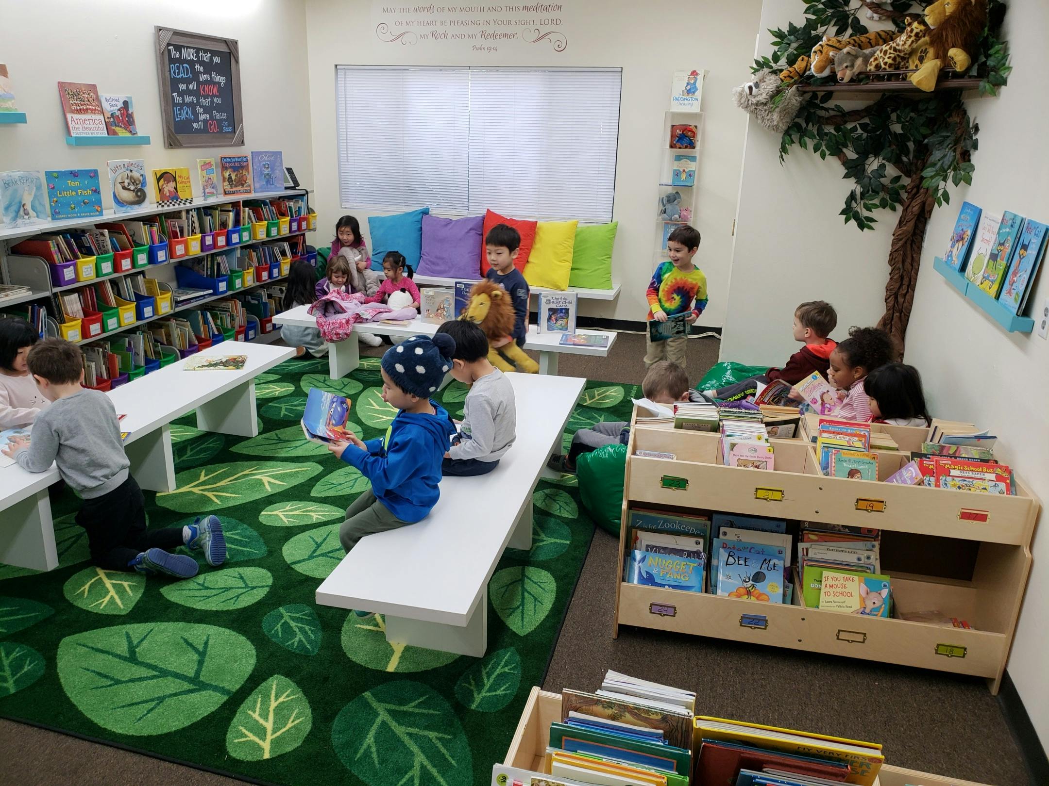 Children reading and playing in a classroom