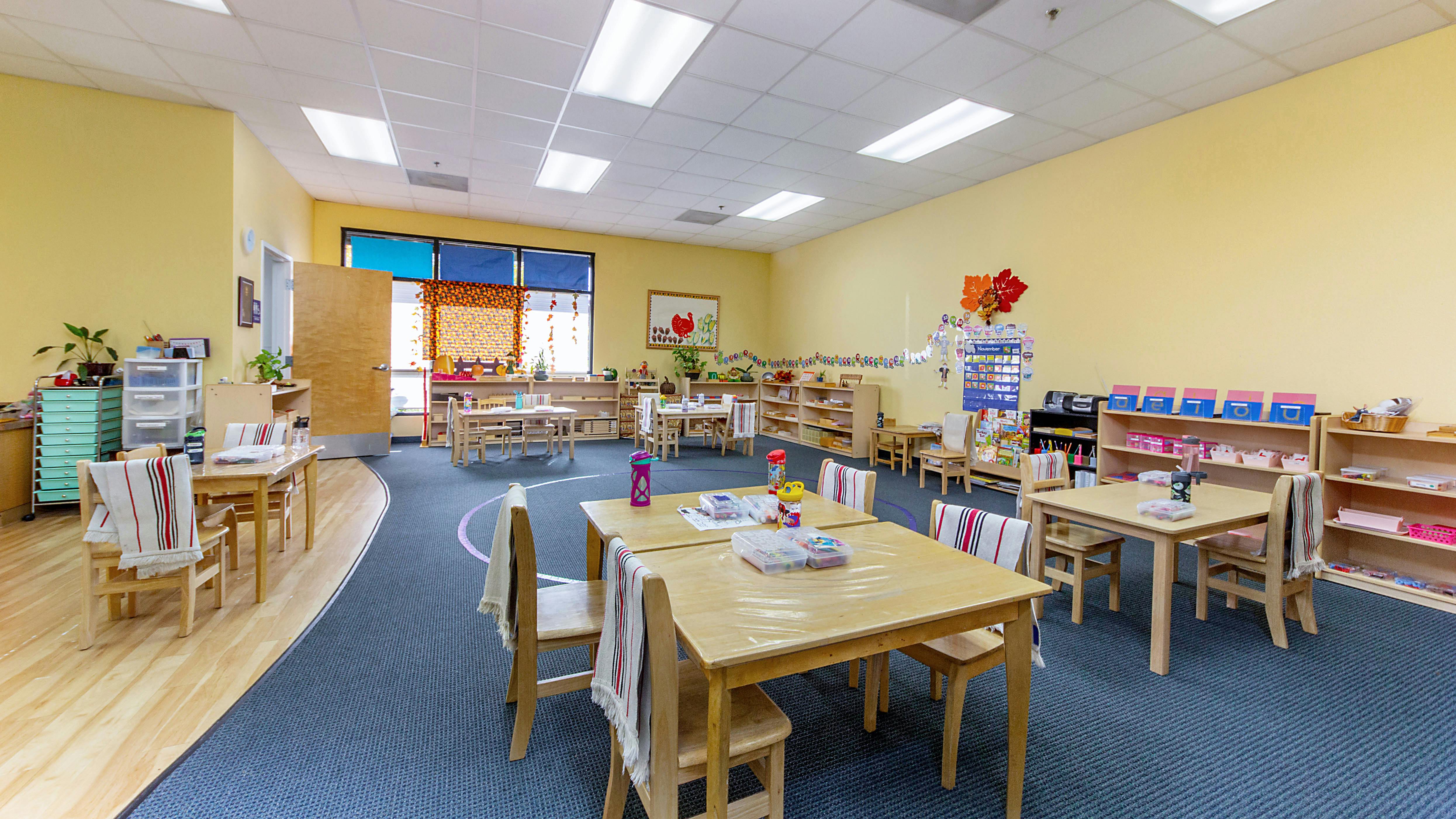 Classroom with small tables and chairs