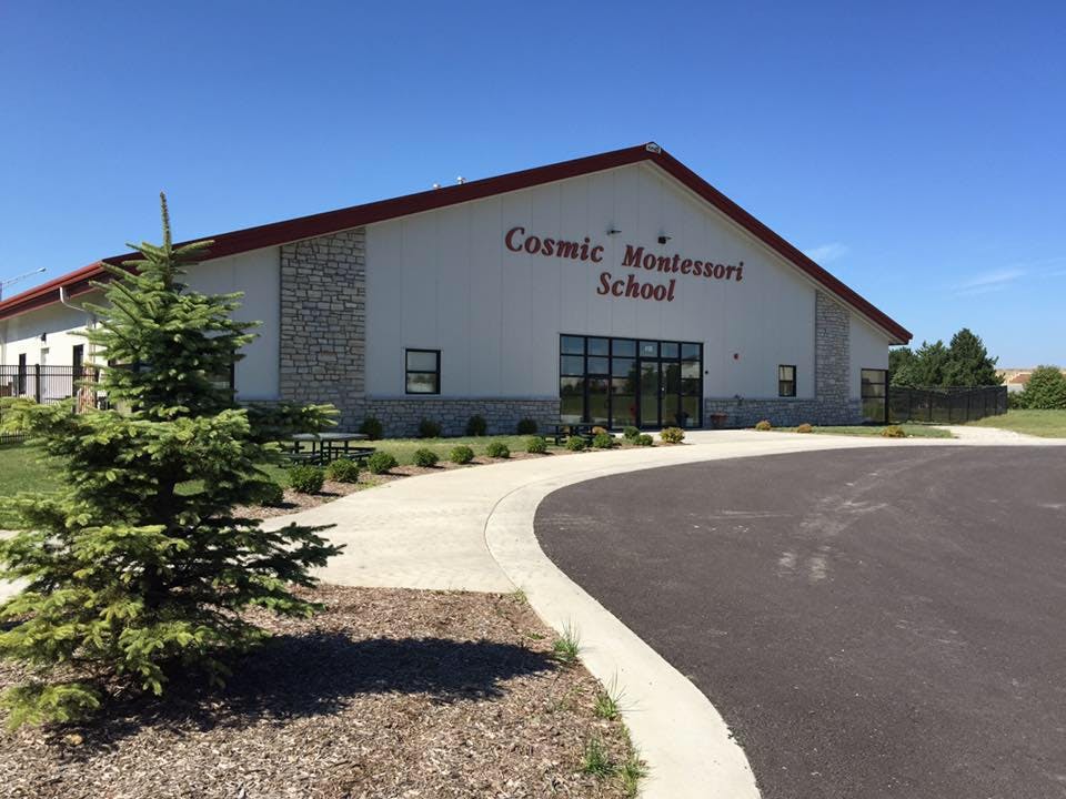 Cosmic Montessori School building exterior with a curved driveway
