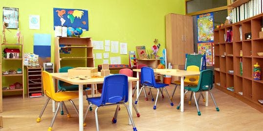 Classroom with small tables and chairs