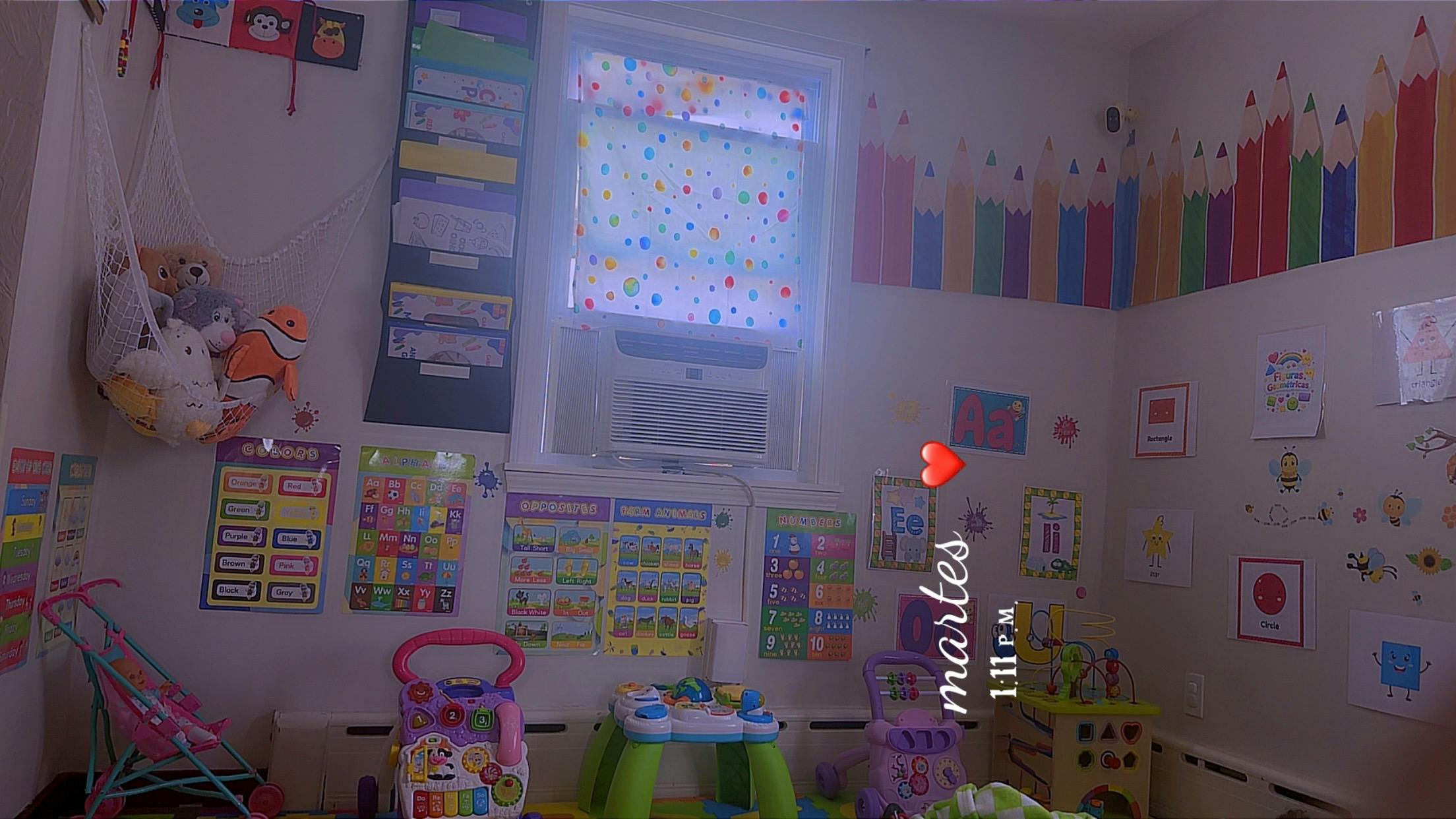 Children room with educational wall posters and toys