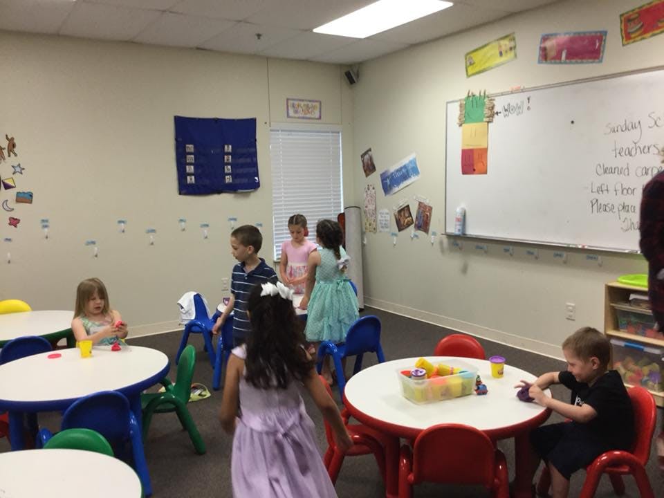 Children playing in a classroom