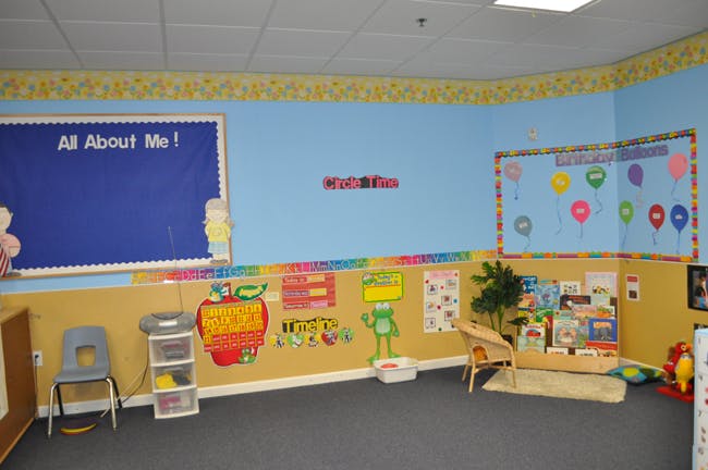 Classroom with bulletin boards and child-sized furniture
