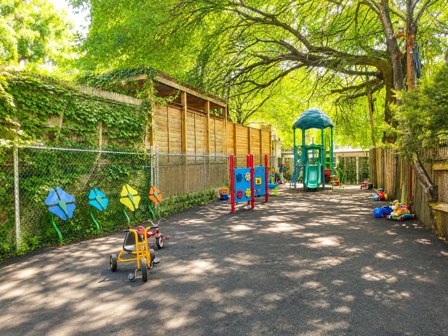 Outdoor children's playground area with toys and play equipment