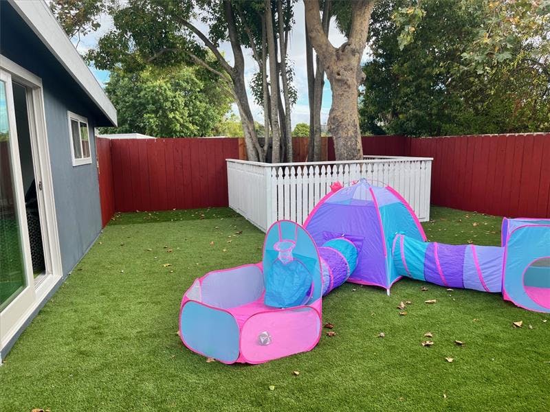 Play tunnel and ball pit on artificial grass