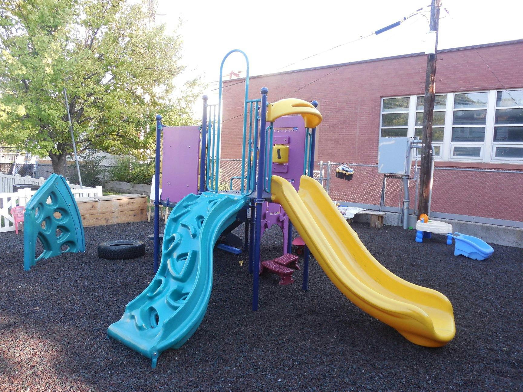 Playground with slides and climbing structures