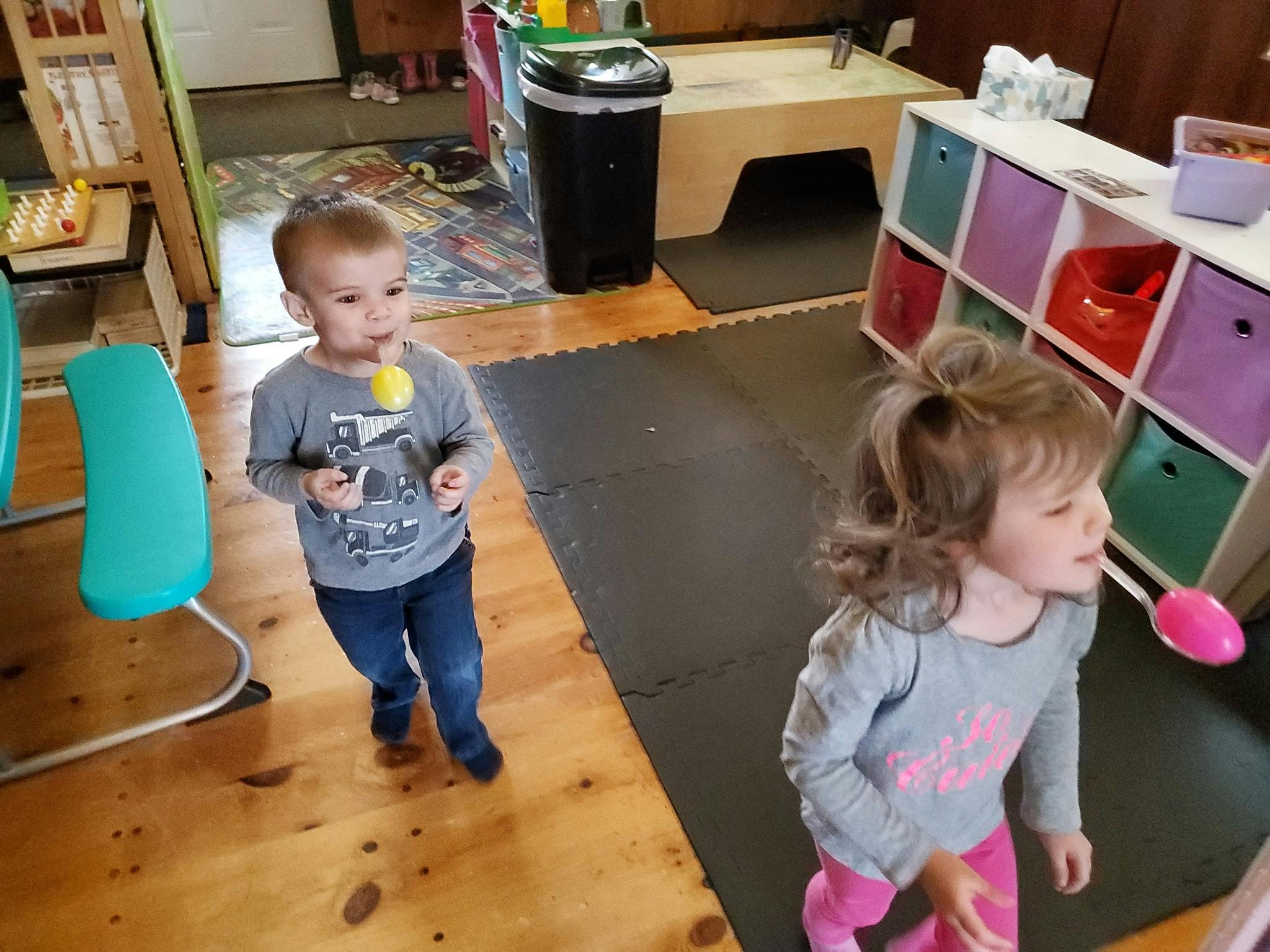 Two children playing indoors