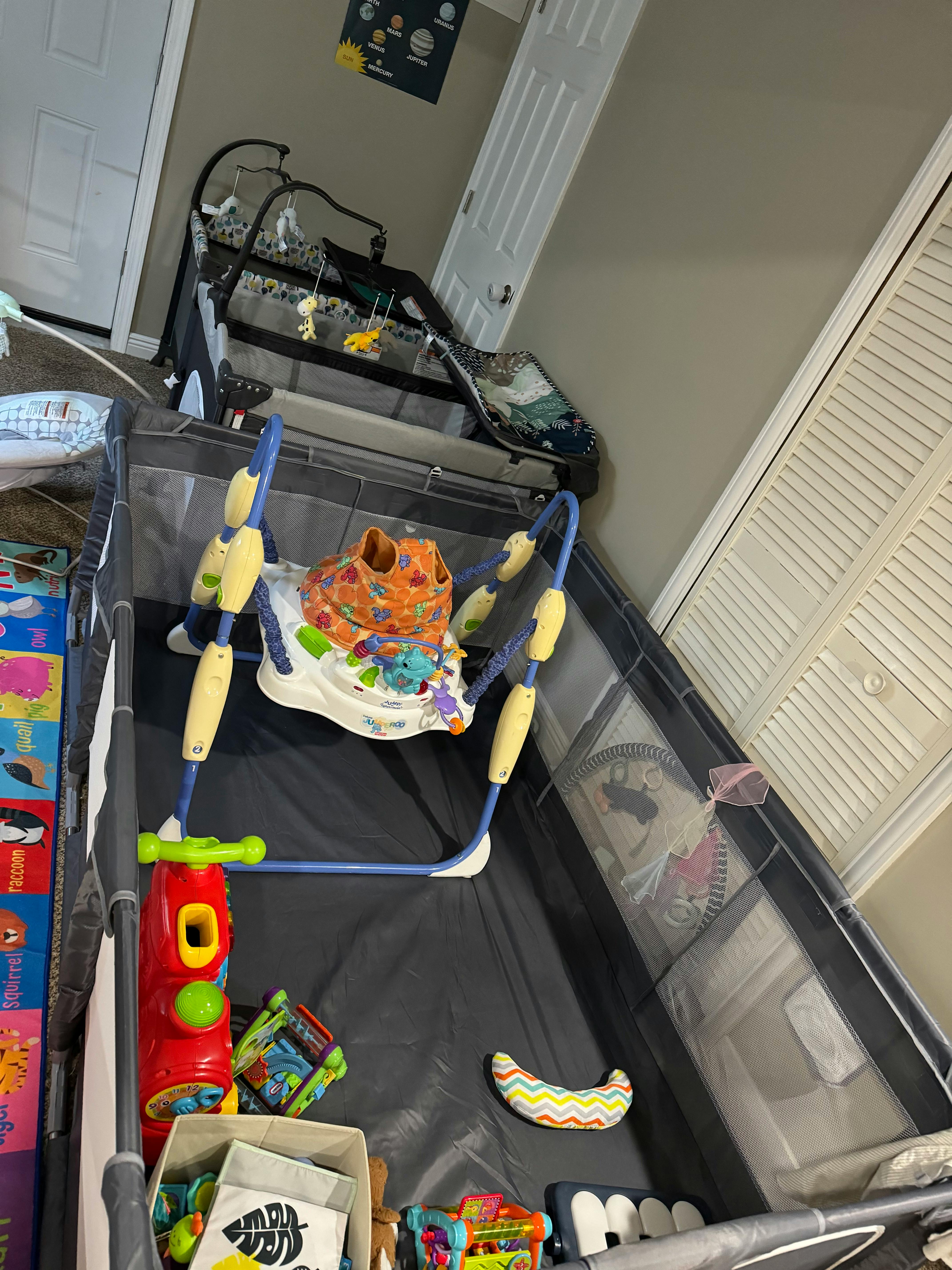 Baby bouncer and playpen with toys