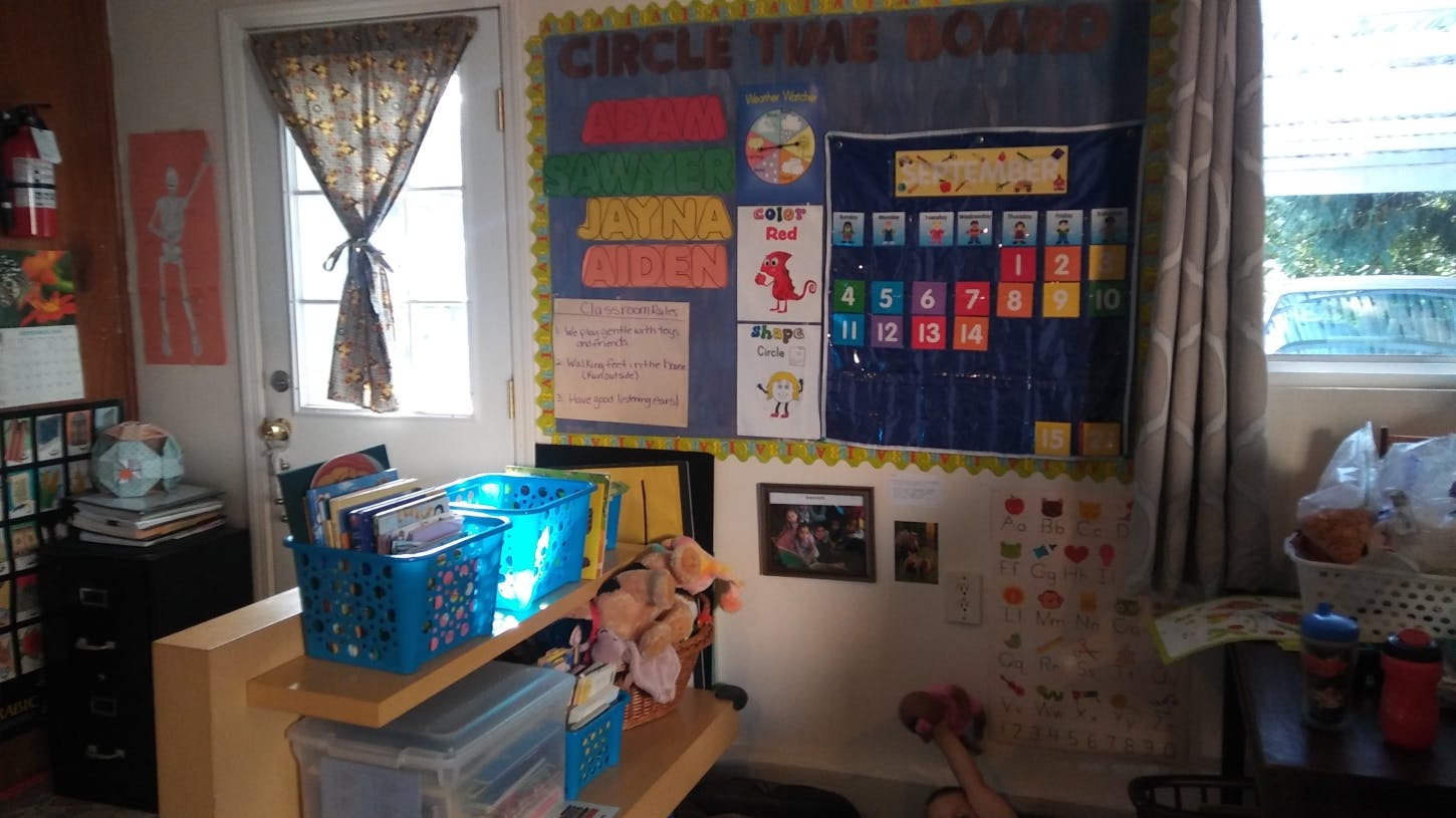 Classroom with a bulletin board and various learning materials