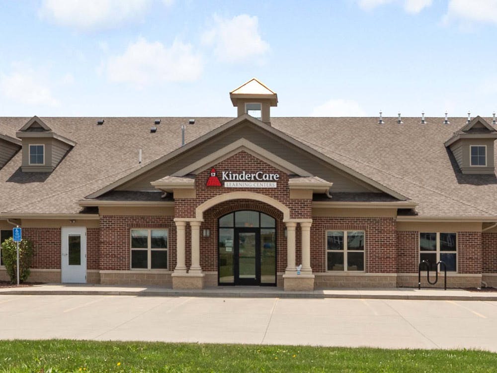 KinderCare Learning Centers building exterior with a parking lot in front