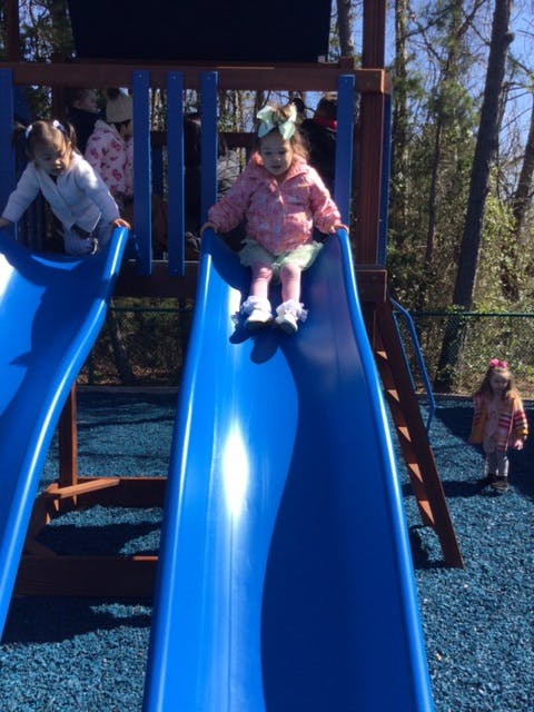 Children on a playground slide