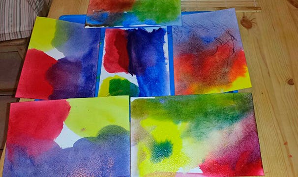 Multiple watercolor paintings with abstract shapes