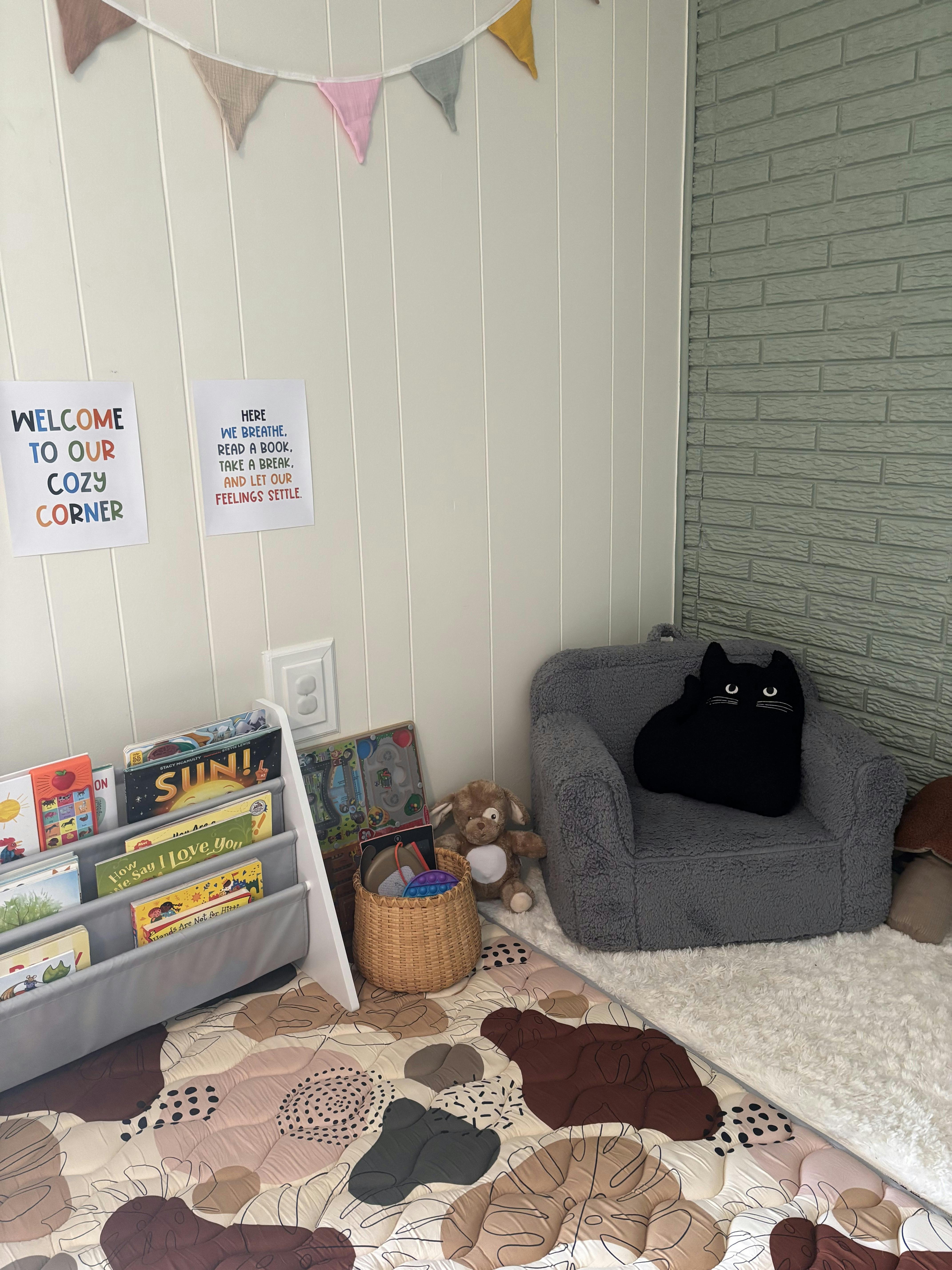Cozy reading corner for children with a small armchair, bookshelf, and signs