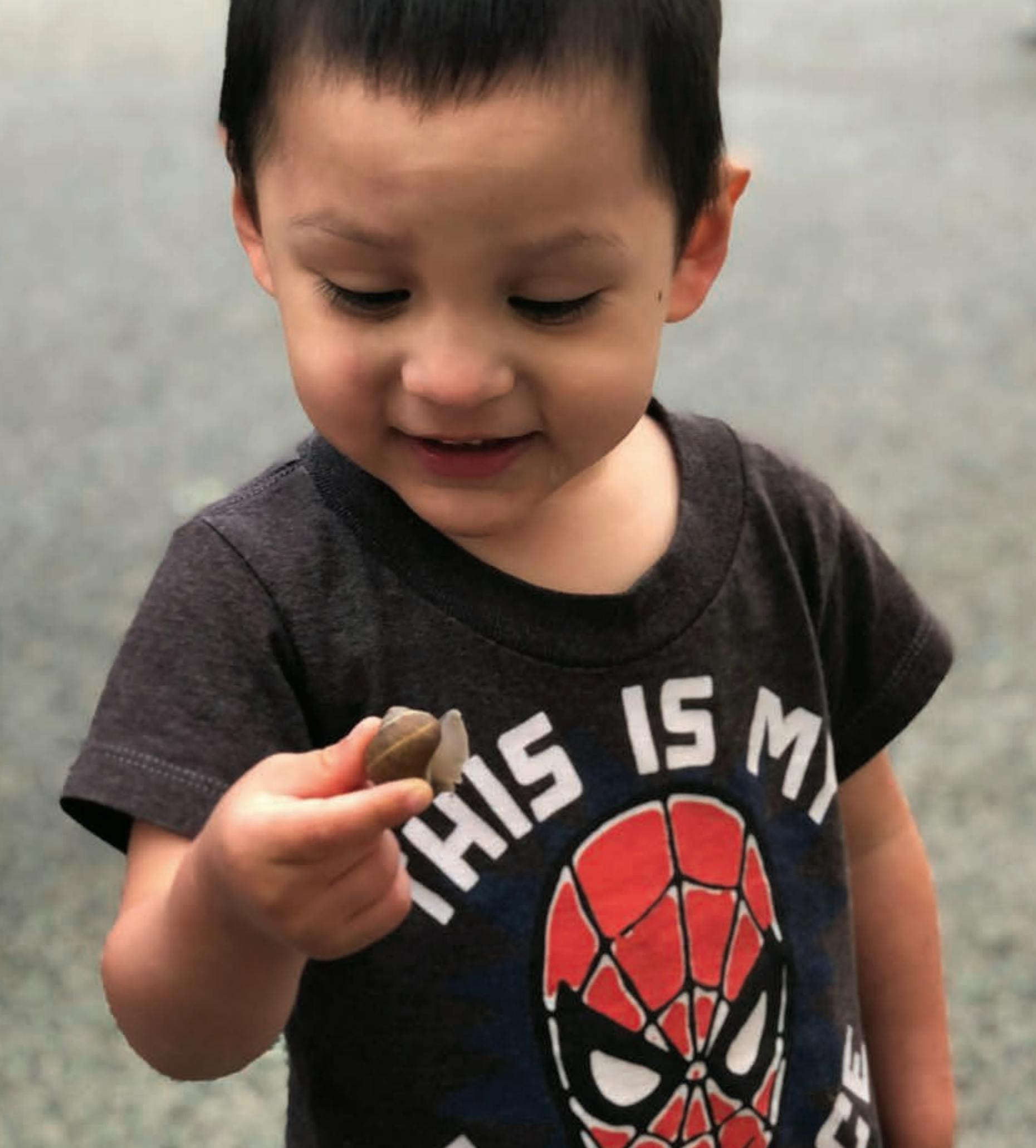 Child holding a small object