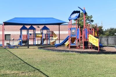 Playground with slides and climbing structures