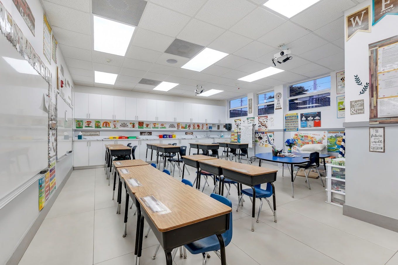 Empty classroom with rows of desks and chairs