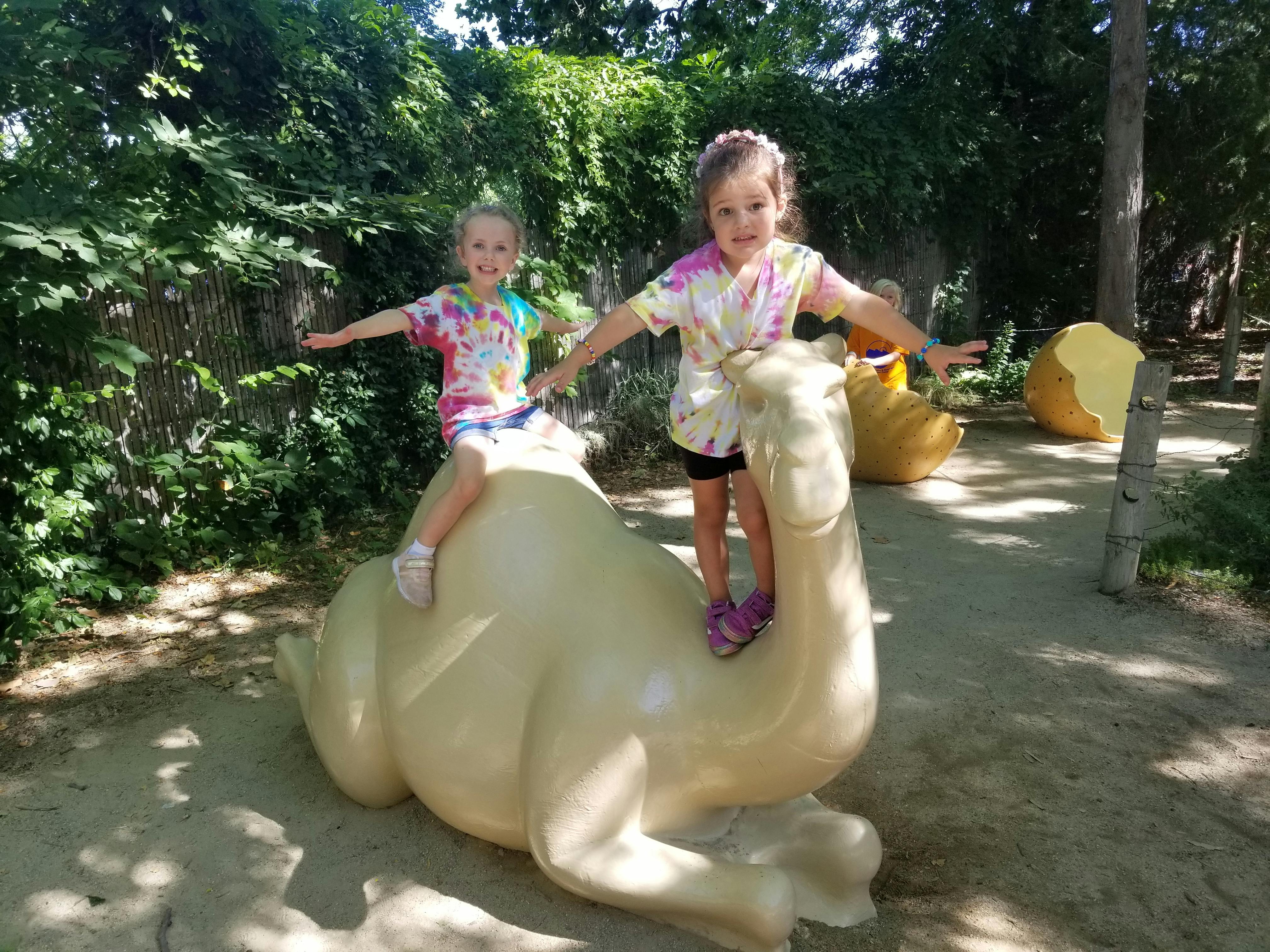 Two children on a camel statue