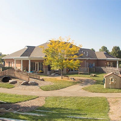 Building with a playground in front