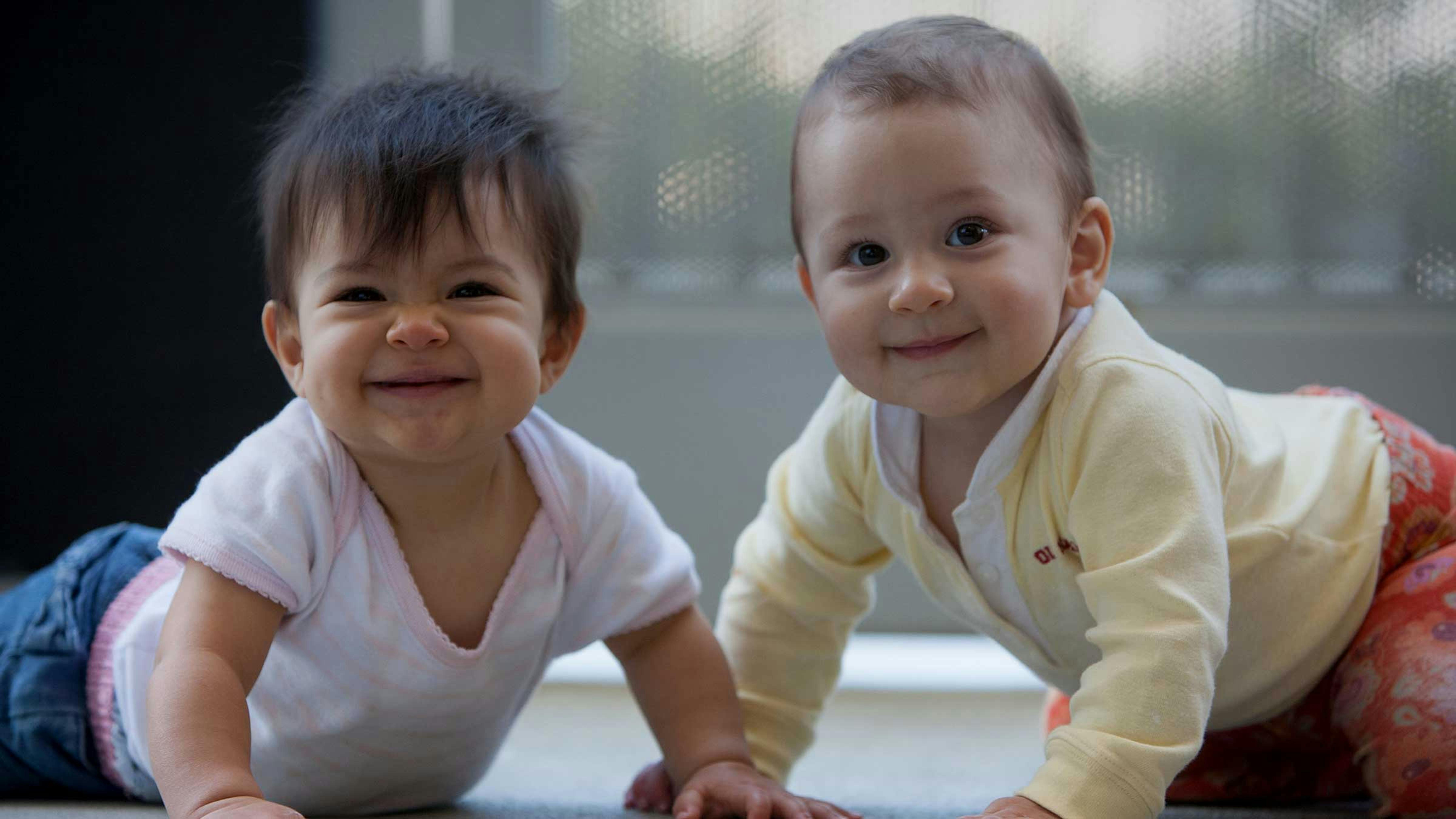 Two babies crawling