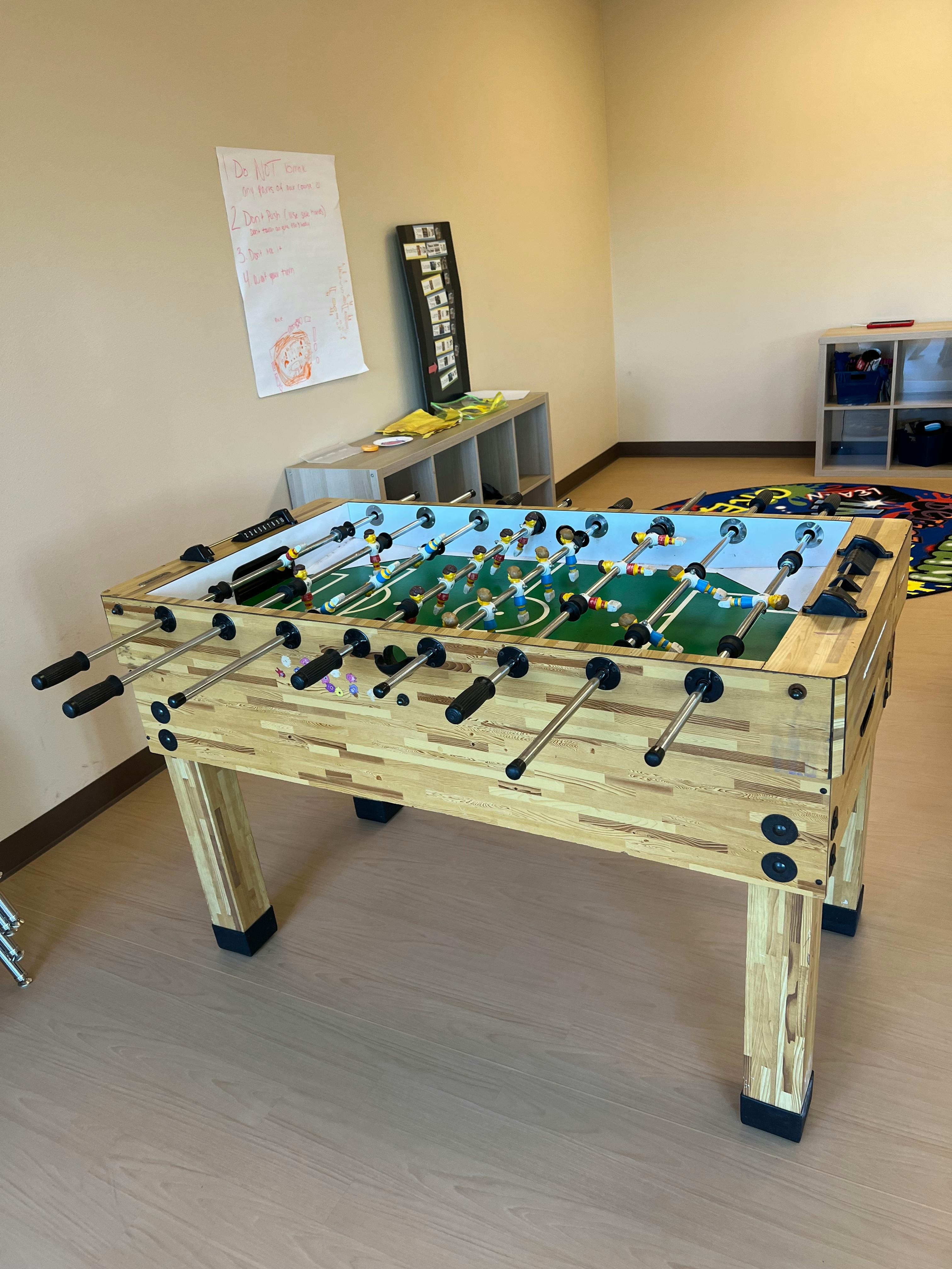 Foosball table in a room