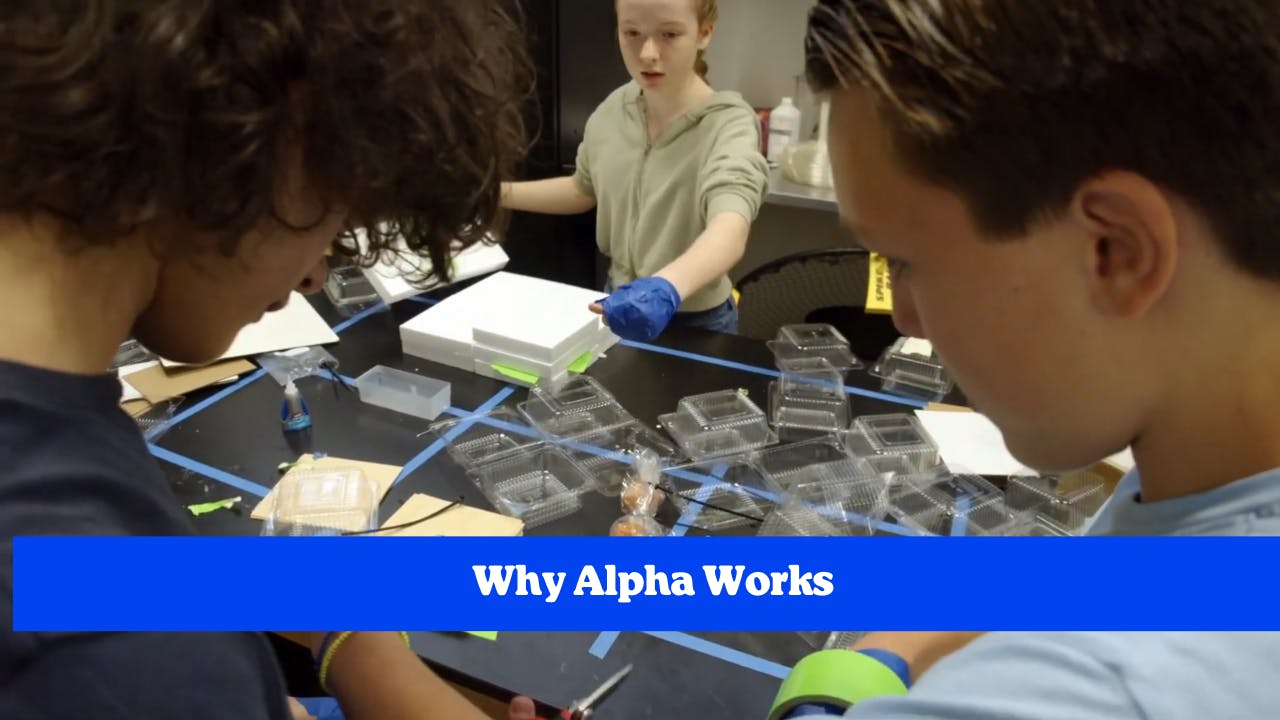 Three teens assembling clear plastic containers on a black table