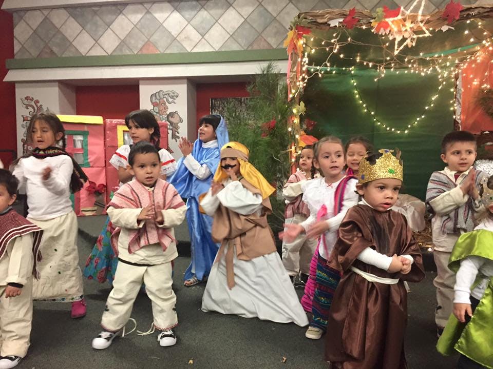 Children in costumes performing a play