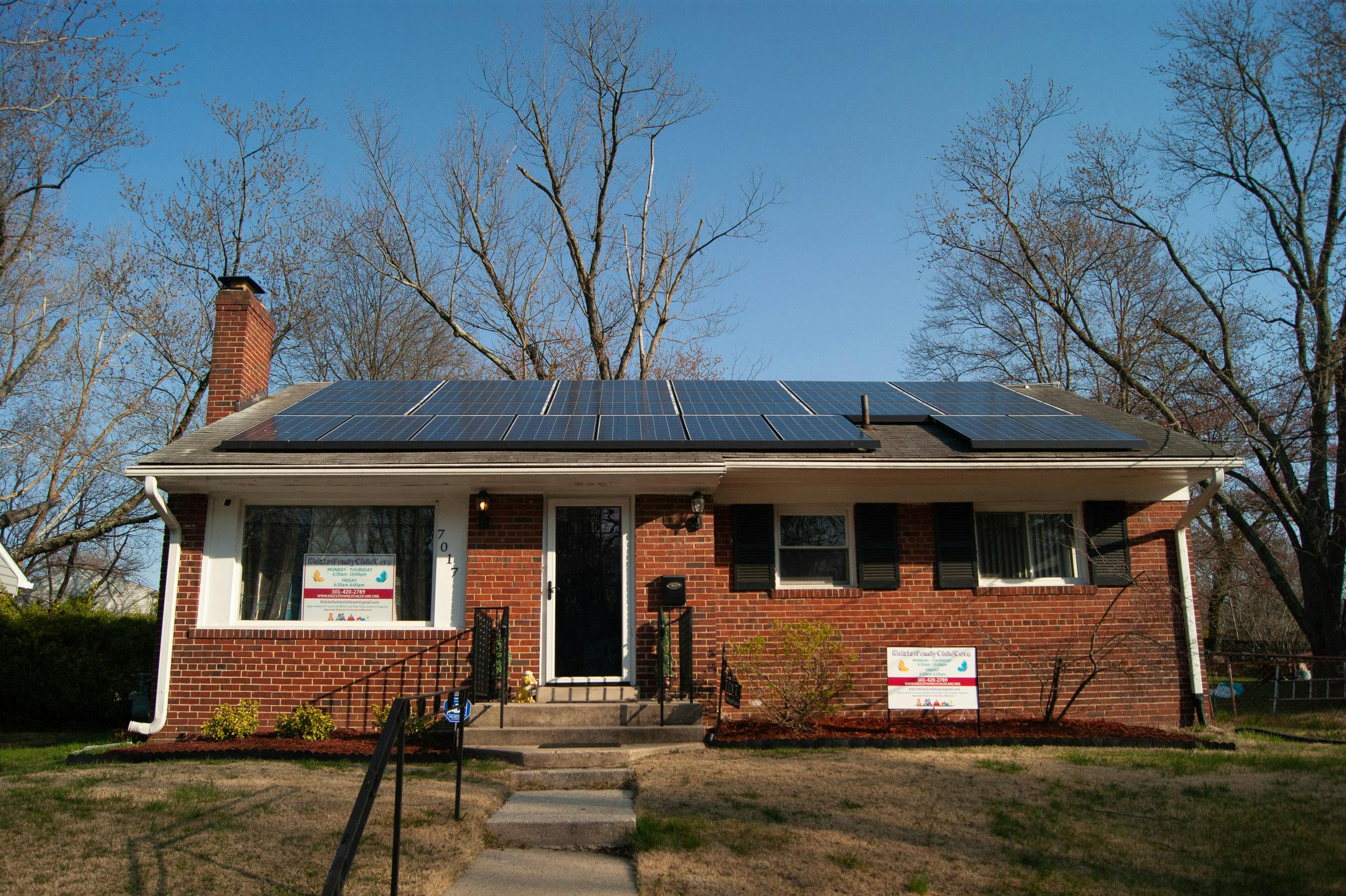 Brick house with solar panels on the roof