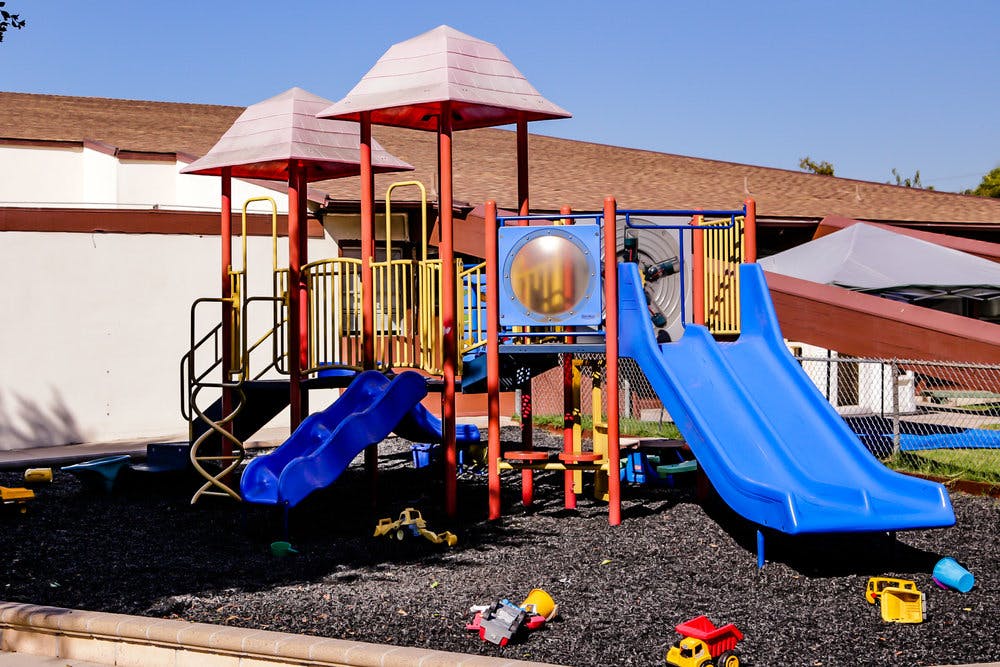 Playground with slides and climbing structures