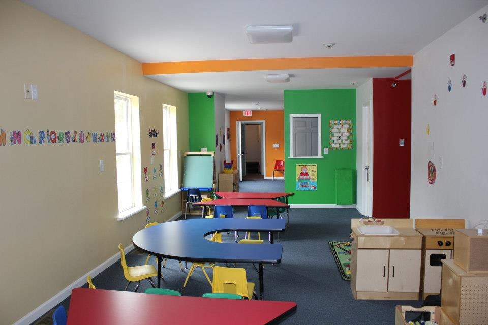 Classroom with colorful tables and chairs