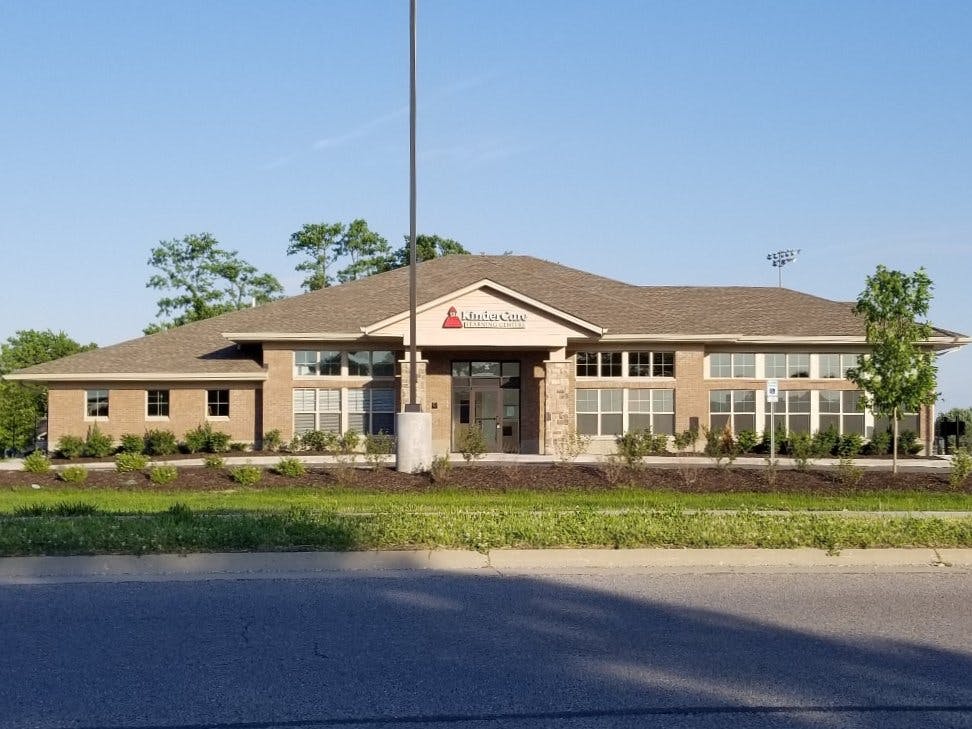 Brick building with a KinderCare sign