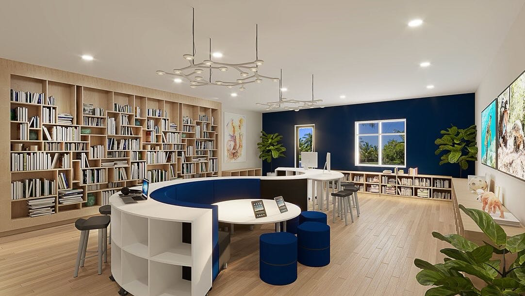 Modern library interior with circular seating and bookshelves