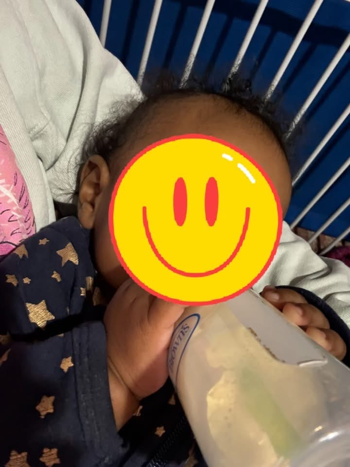 Child drinking from a bottle