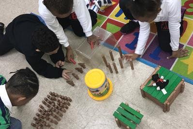 Children playing with blocks on the floor