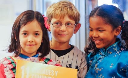 Three children posing together