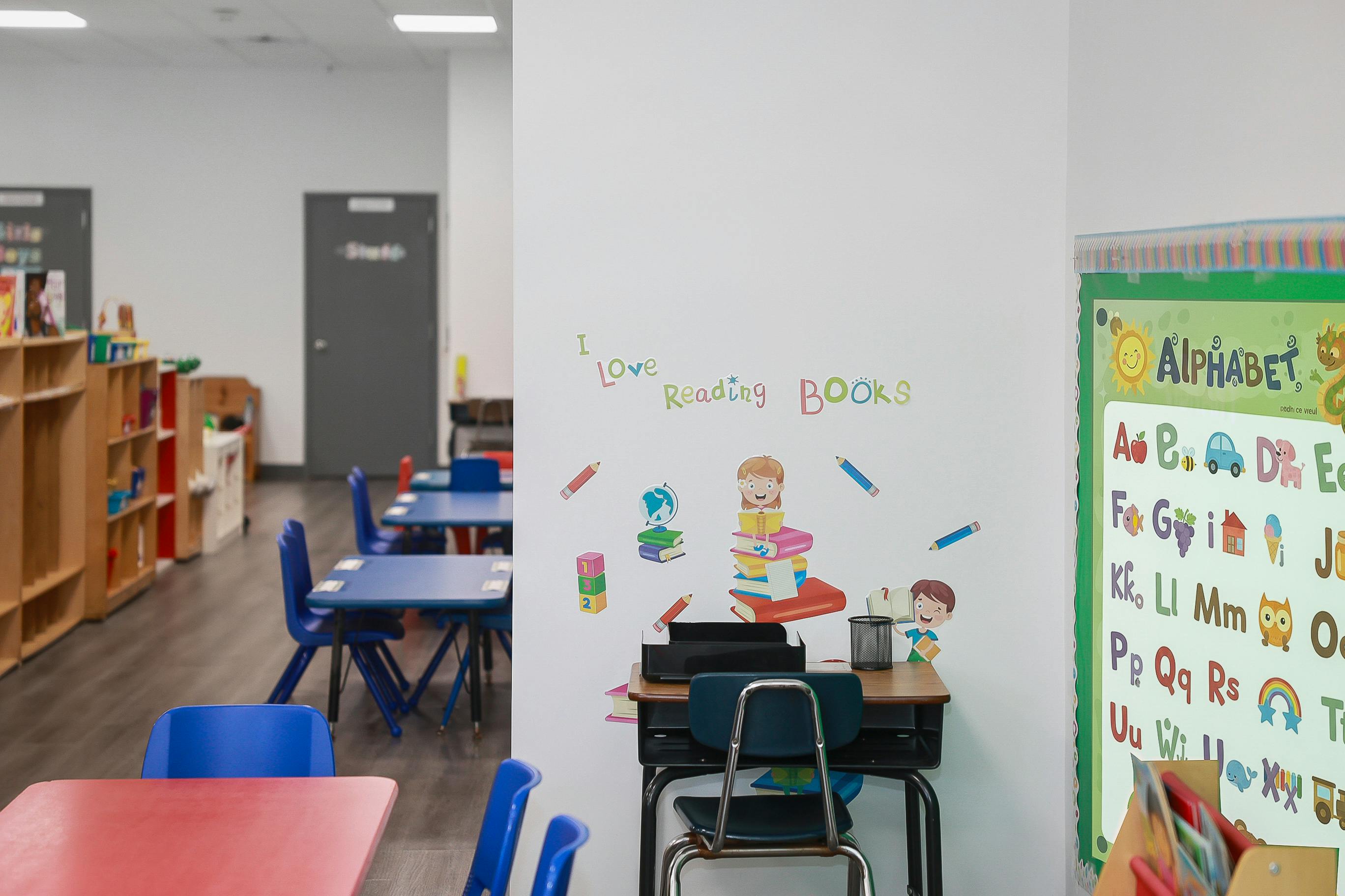 Classroom wall with reading decal and alphabet chart