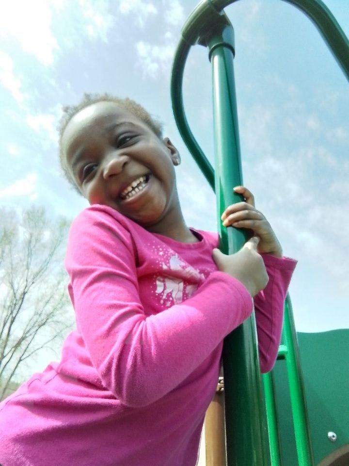 Child on a playground structure