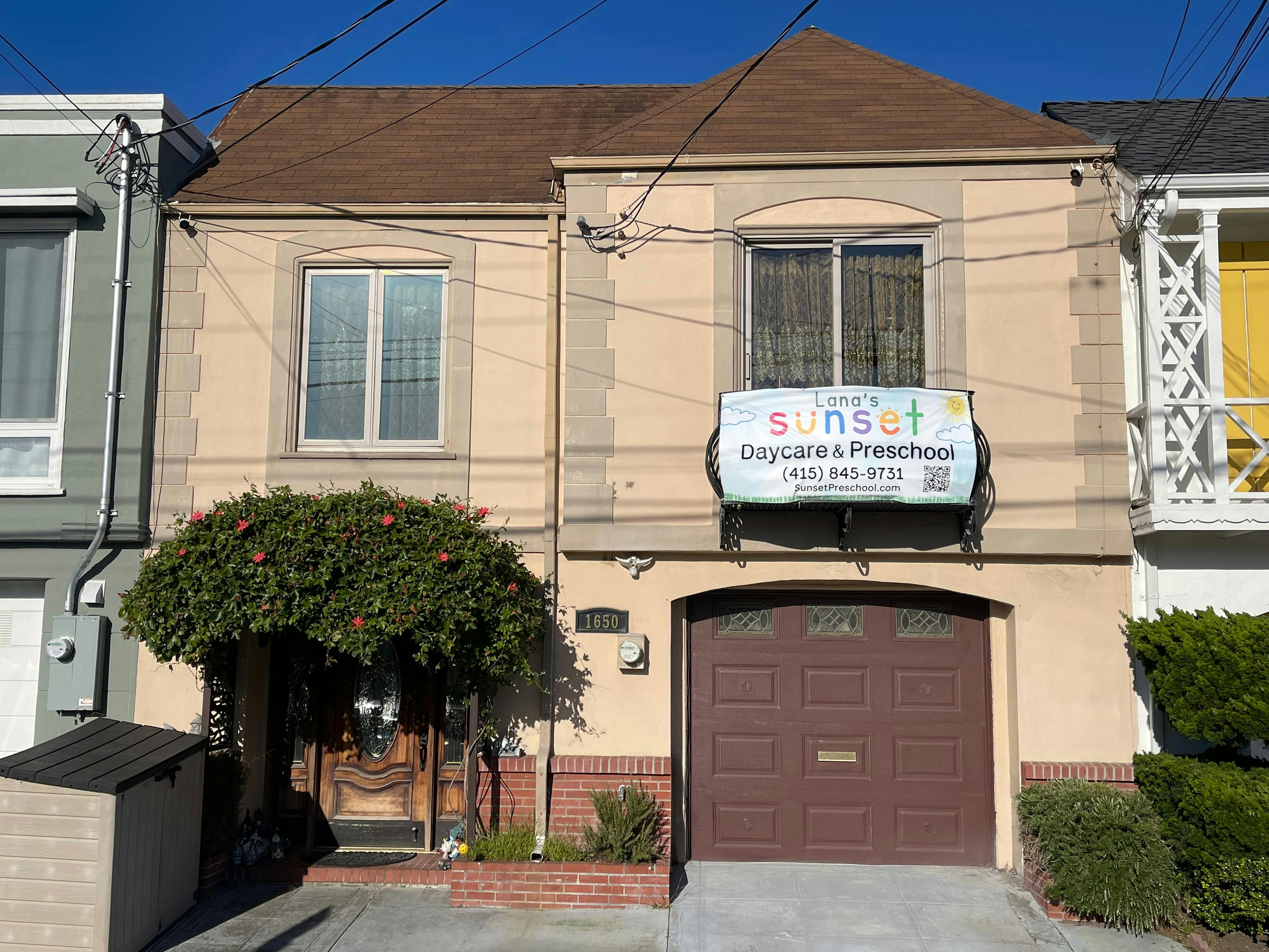 Lana's Sunset Daycare & Preschool sign on the front of a house