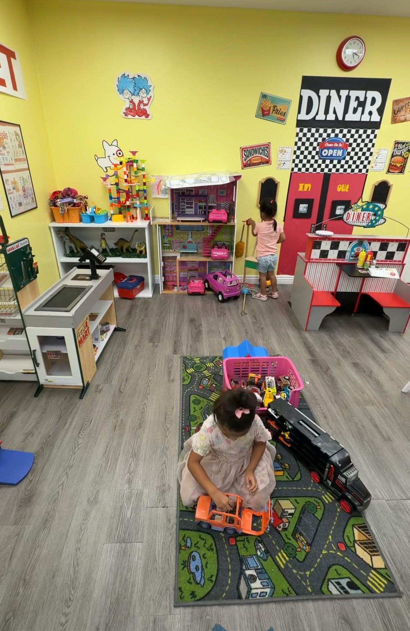 Children playing with toys in a room