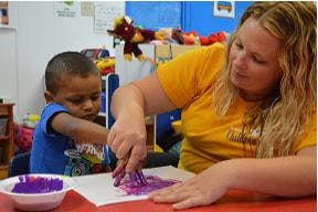 Adult and child finger painting
