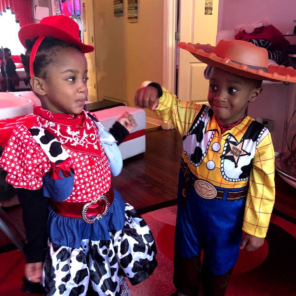 Two children in cowboy costumes