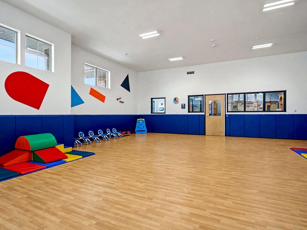 Empty children's playroom with colorful soft play equipment