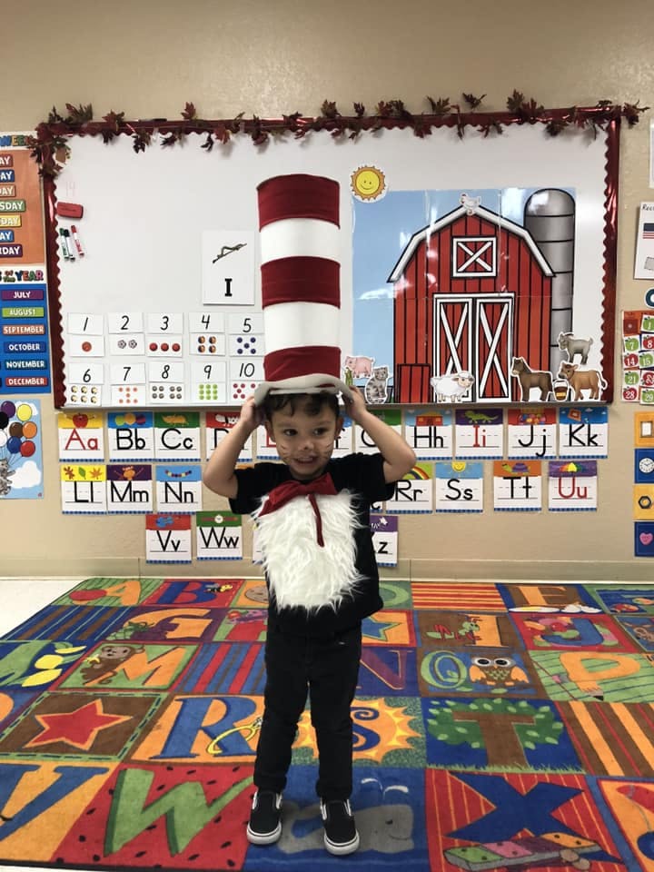 Child in a Cat in the Hat costume in a classroom