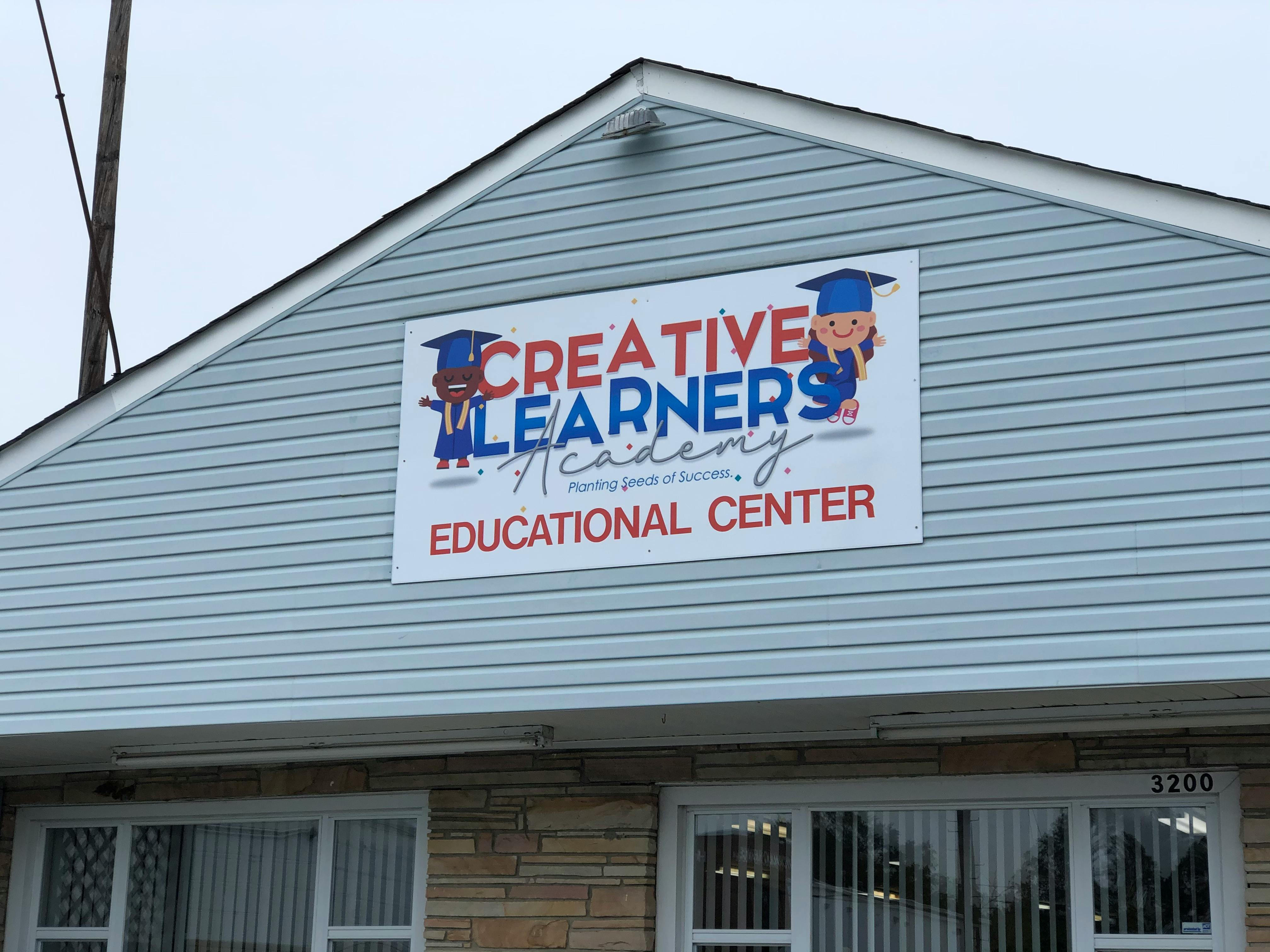 Creative Learners Academy Educational Center sign on a building