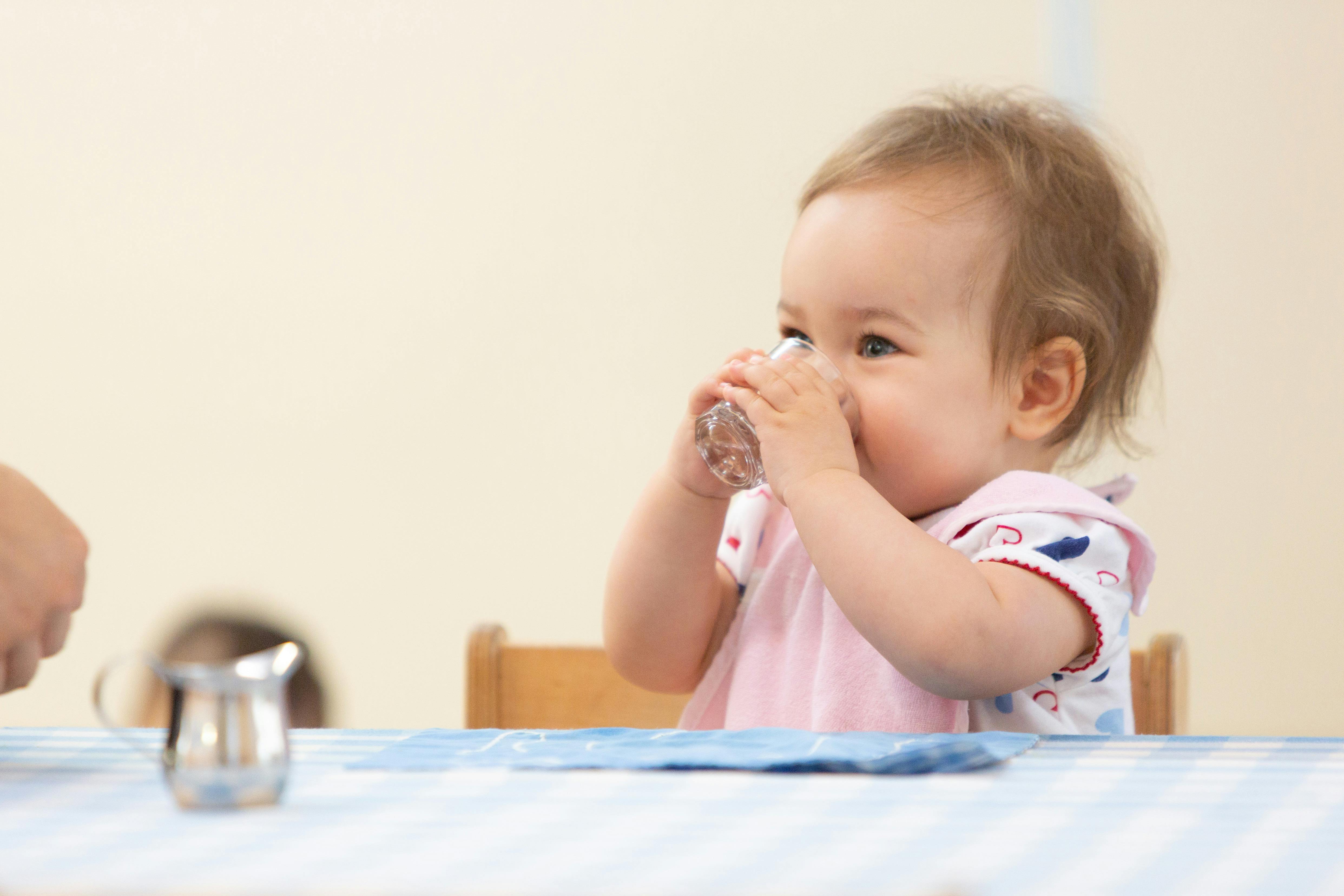 Child drinking from a glass
