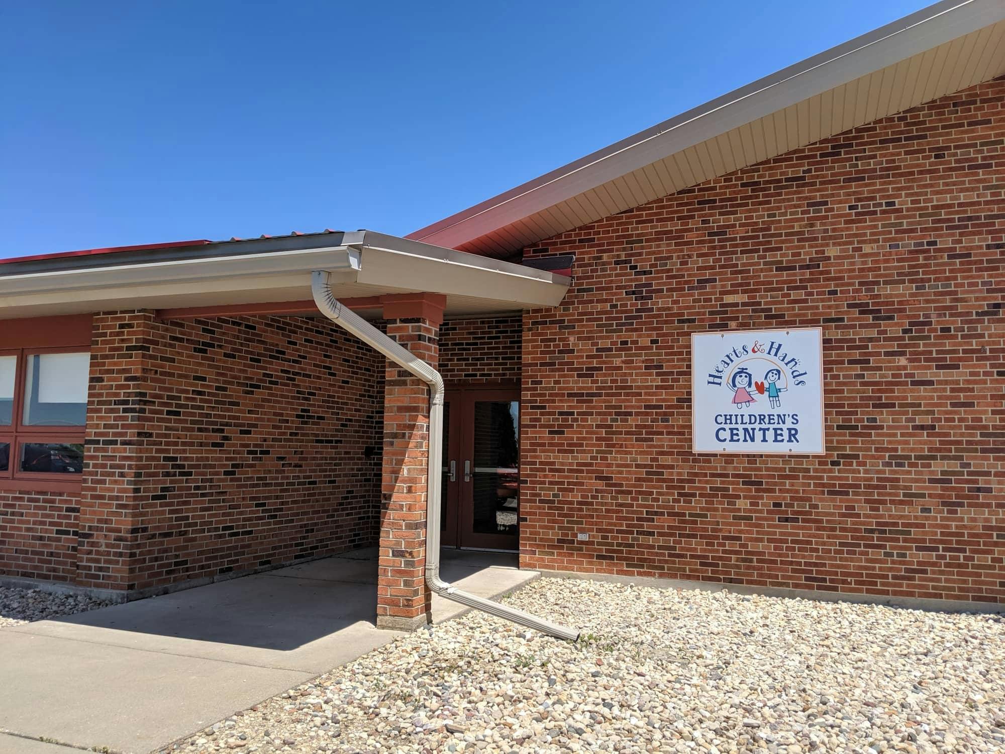 Brick building with a sign that reads "Children's Center"