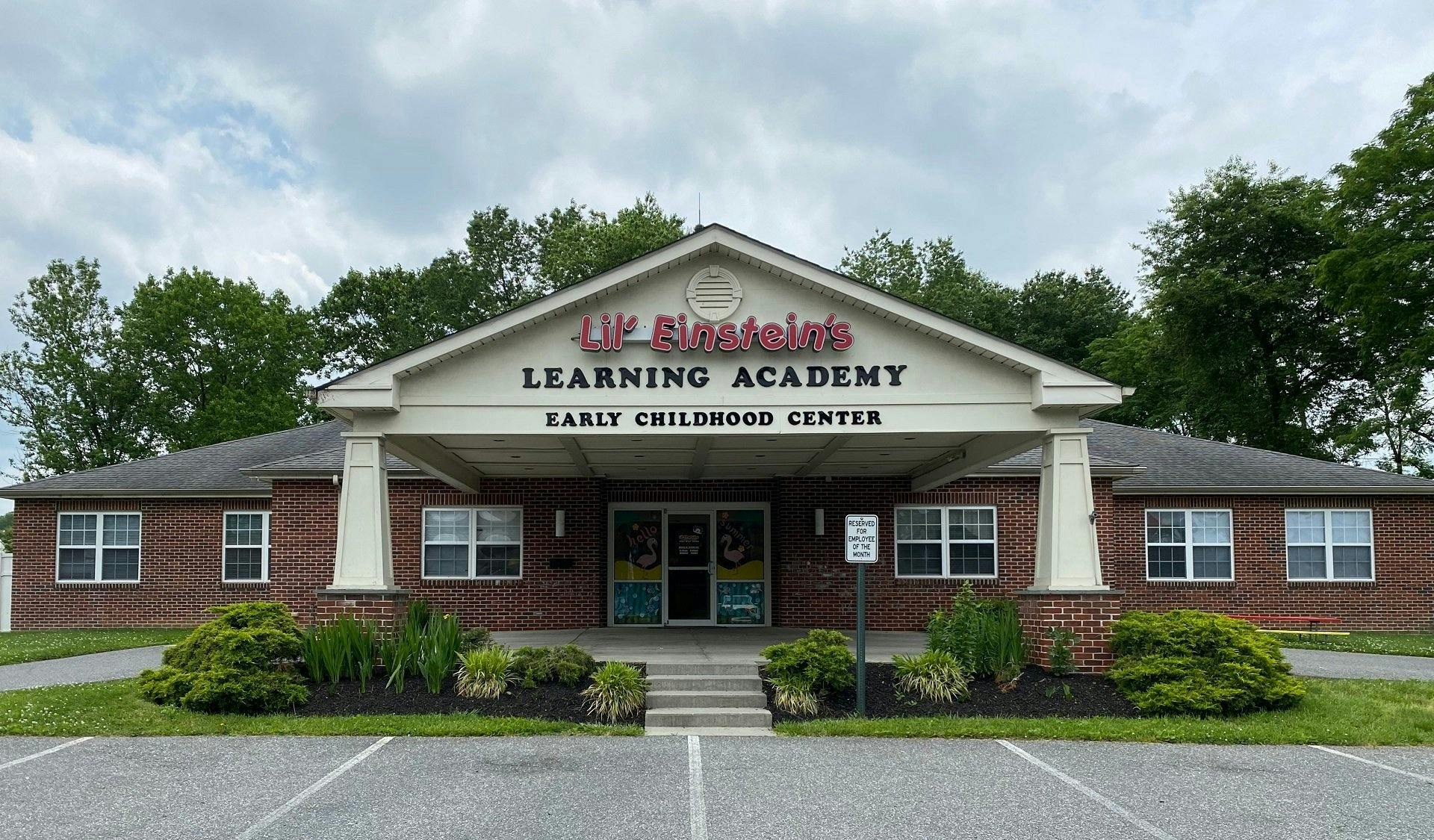 Building with "Learning Academy Early Childhood Center" sign