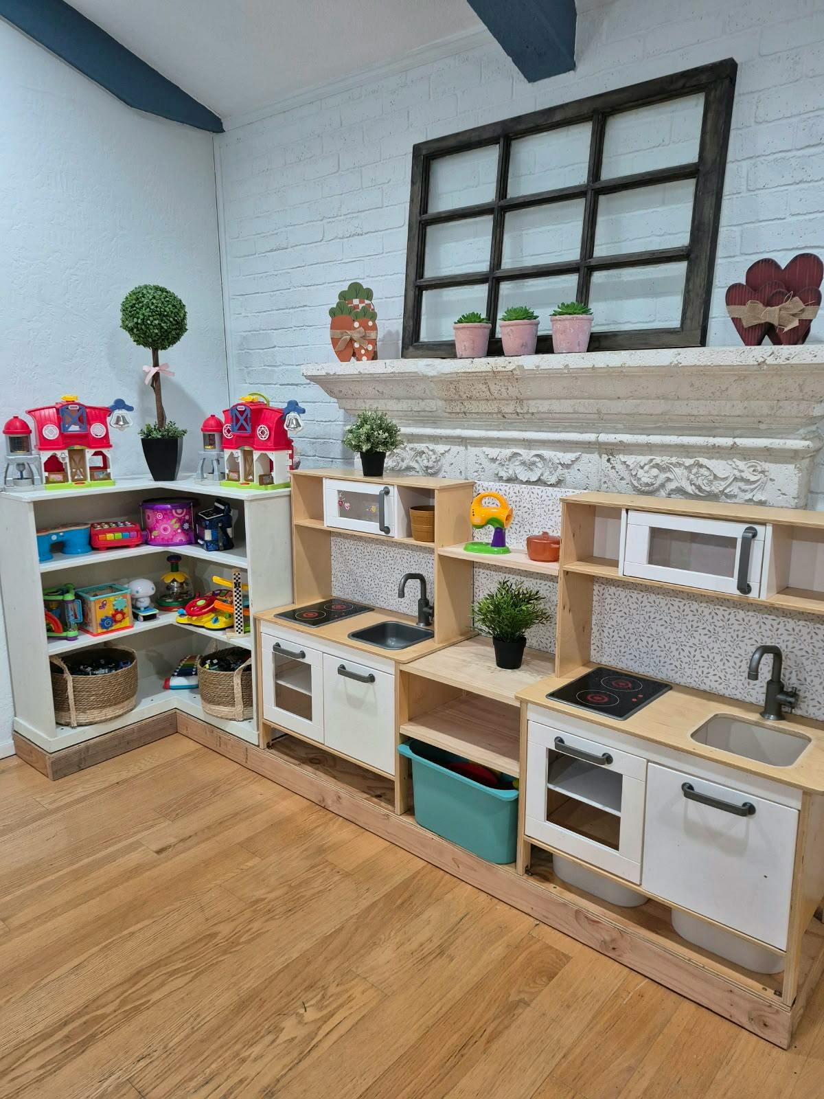 Play kitchen sets and toy shelves in a playroom