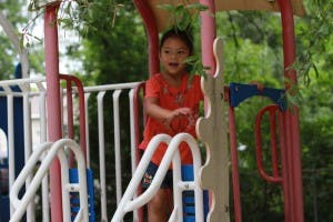 Child on a playground structure